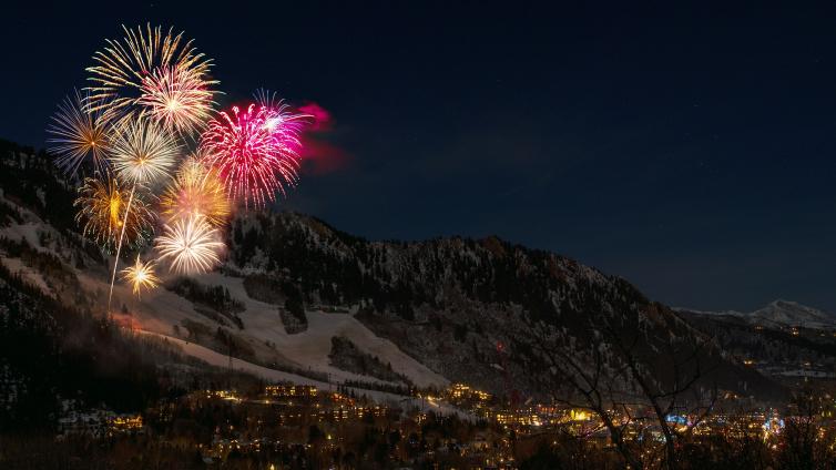 Fireworks on a snowy hill